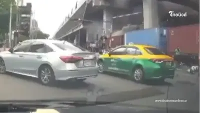 จับภาพได้เต็มๆ นาทีรถไฟพุ่งชนรถเมล์กลางแยกอโศก ก่อนไฟลุกท่วม