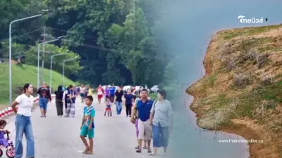 แห่ชมความแปลกตา น้ำลดในรอบ 50 ปี เผย "ใบหน้าสาวงาม" เขื่อนดินช่องเขาขาด